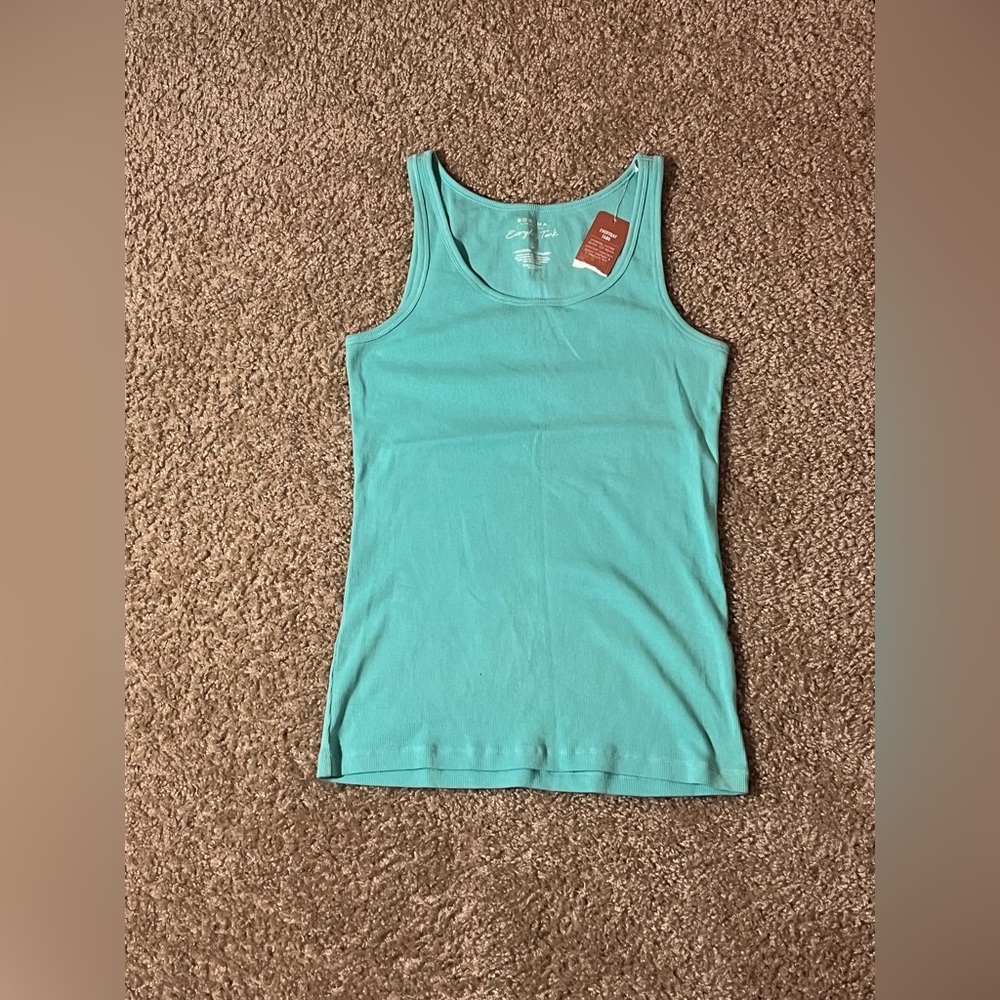 Aqua Blue tank. Size S. Never worn.